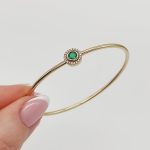 Sárga arany karperec gyémánttal és smaragddal