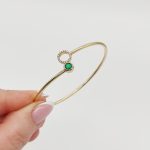 Sárga arany karperec gyémánttal és smaragddal