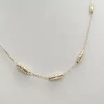 Sárga arany orsó mintás nyaklánc