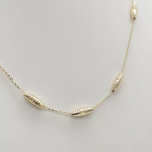 Sárga arany orsó mintás nyaklánc