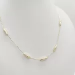 Sárga arany orsó mintás nyaklánc