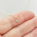 Sárga arany nyaklánc gyémánt csepp medállal