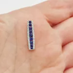 Fehér arany medál gyémánttal és zafírral