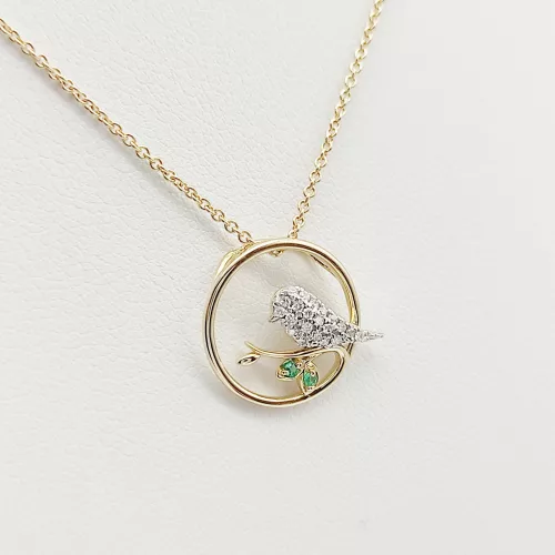 Sárga arany madárka medál gyémánttal és smaragddal