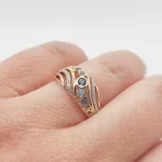 Sárga arany gyűrű gyémánttal és topázzal