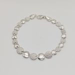 Ezüst elől szélesedő kerek mintás szegedi karlánc - 18 cm