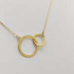 Sárga arany nyaklánc dupla karika medállal