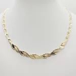 Sárga arany elől szélesedő modern nyakék